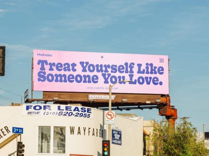 a billboard for the brand Madhappy